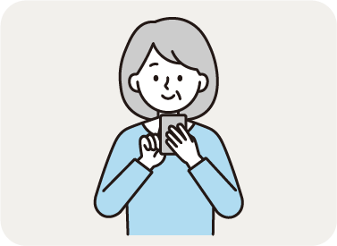 スマートフォンを操作する女性